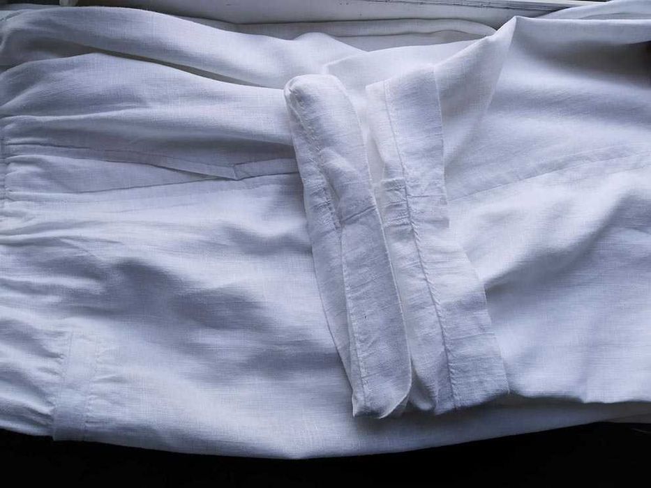 Белые льняные  брюки  фасон бананы  на бедра 120 см  лен льон лляні