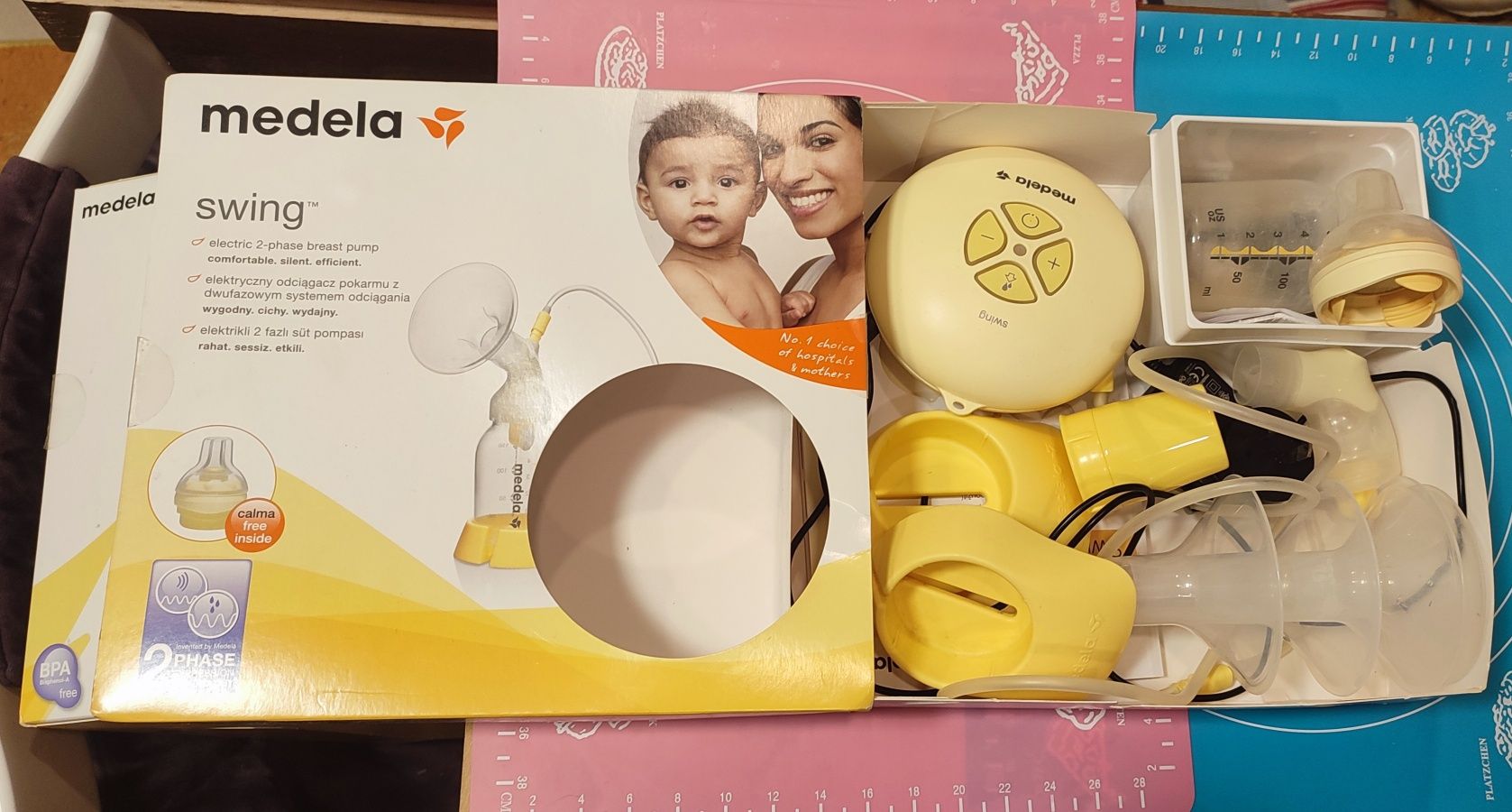 Електричний молоковідсмоктувач Medela swing+ смарт соска calma