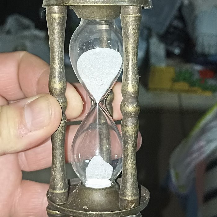Relógio do Tempo em metal e vidro