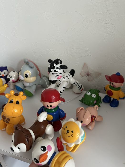 Іграшки погремушки трещітки Tolo Fisher Price