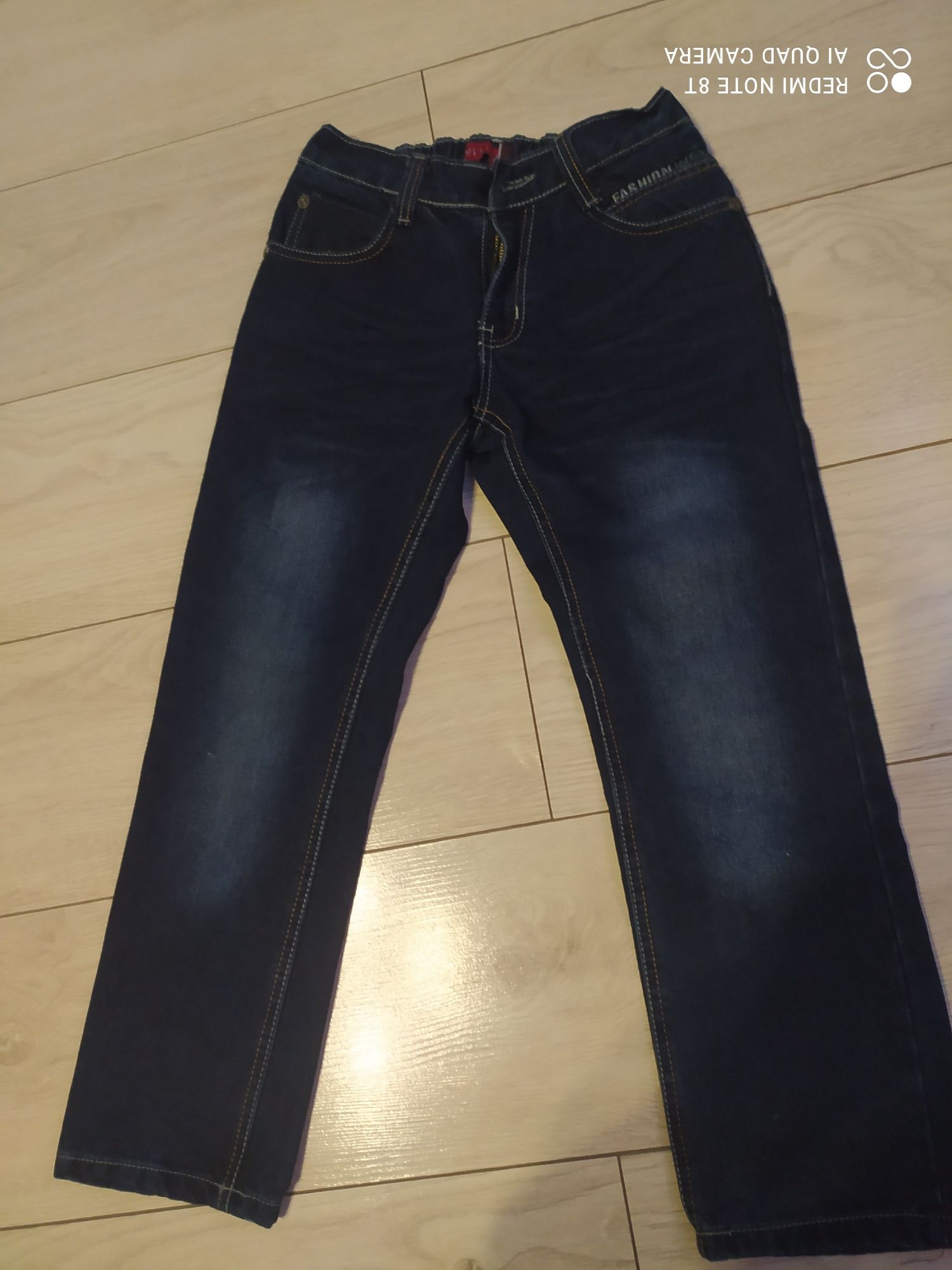 Spodnie jeans granatowe r. 128