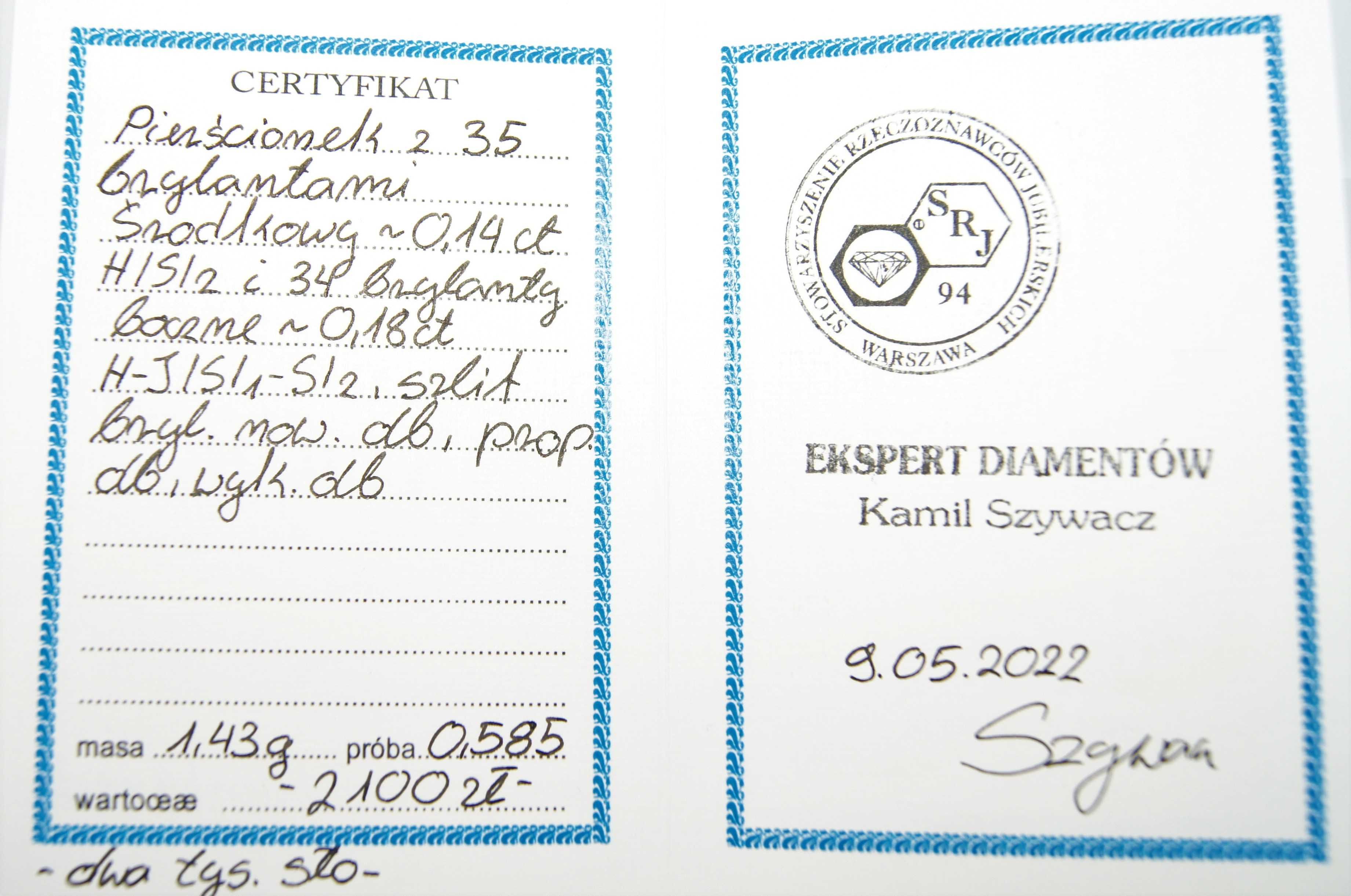 Złoty pierścionek z brylantami p.585/1,43g