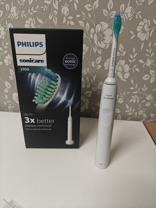 Електрична зубна щітка philips 2100
