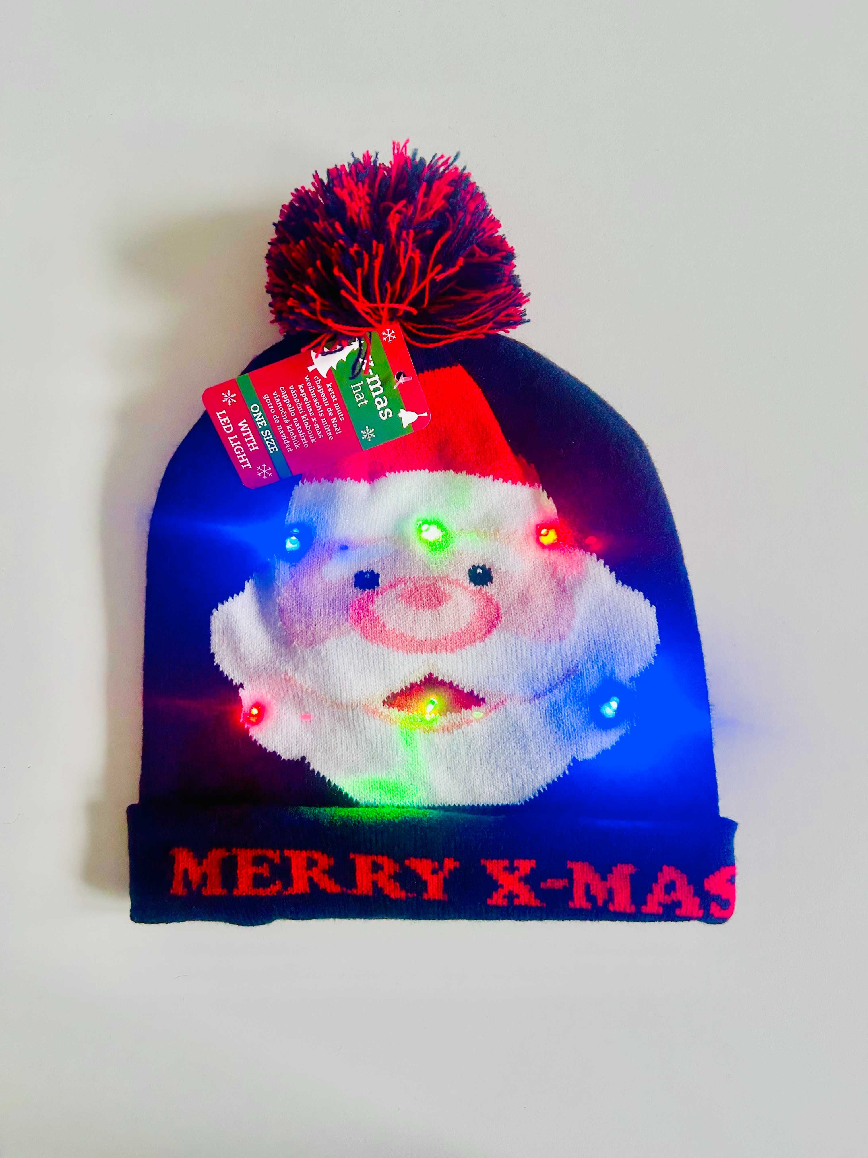 Czapka świąteczna LED z Mikołajem / Czapka z Mikołajem LED Merry X-Mas