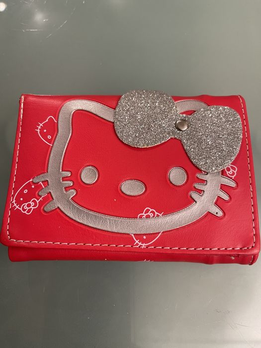 Porta moedas,crianca e senhora