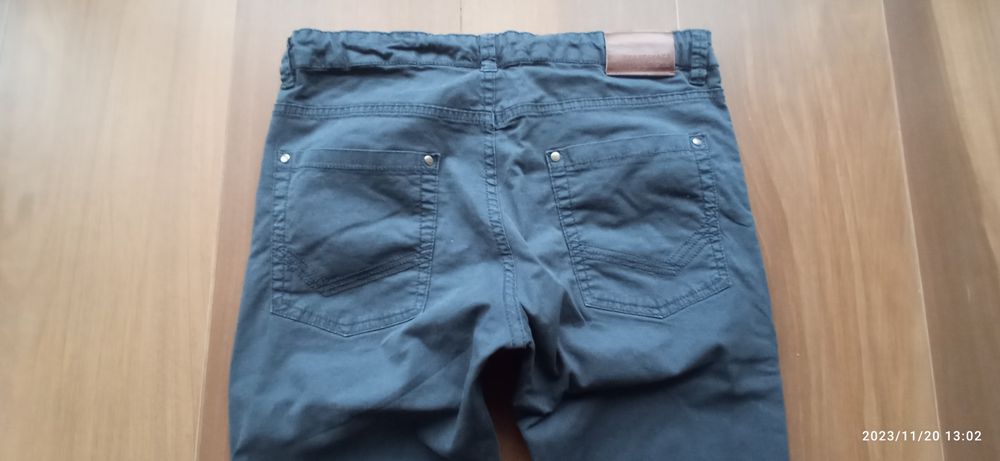 Spodnie Nukutavake slim chłopięce 160 cm