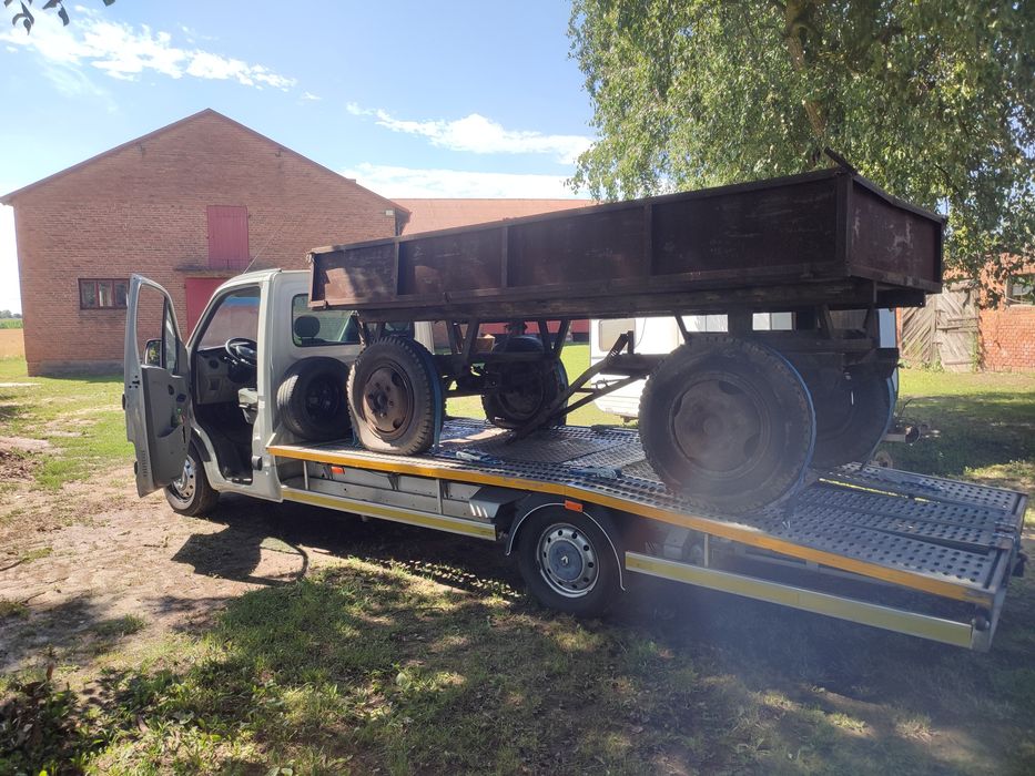 Autolaweta Laweta Pomoc drogowa transport samochodów osobowych maszyn