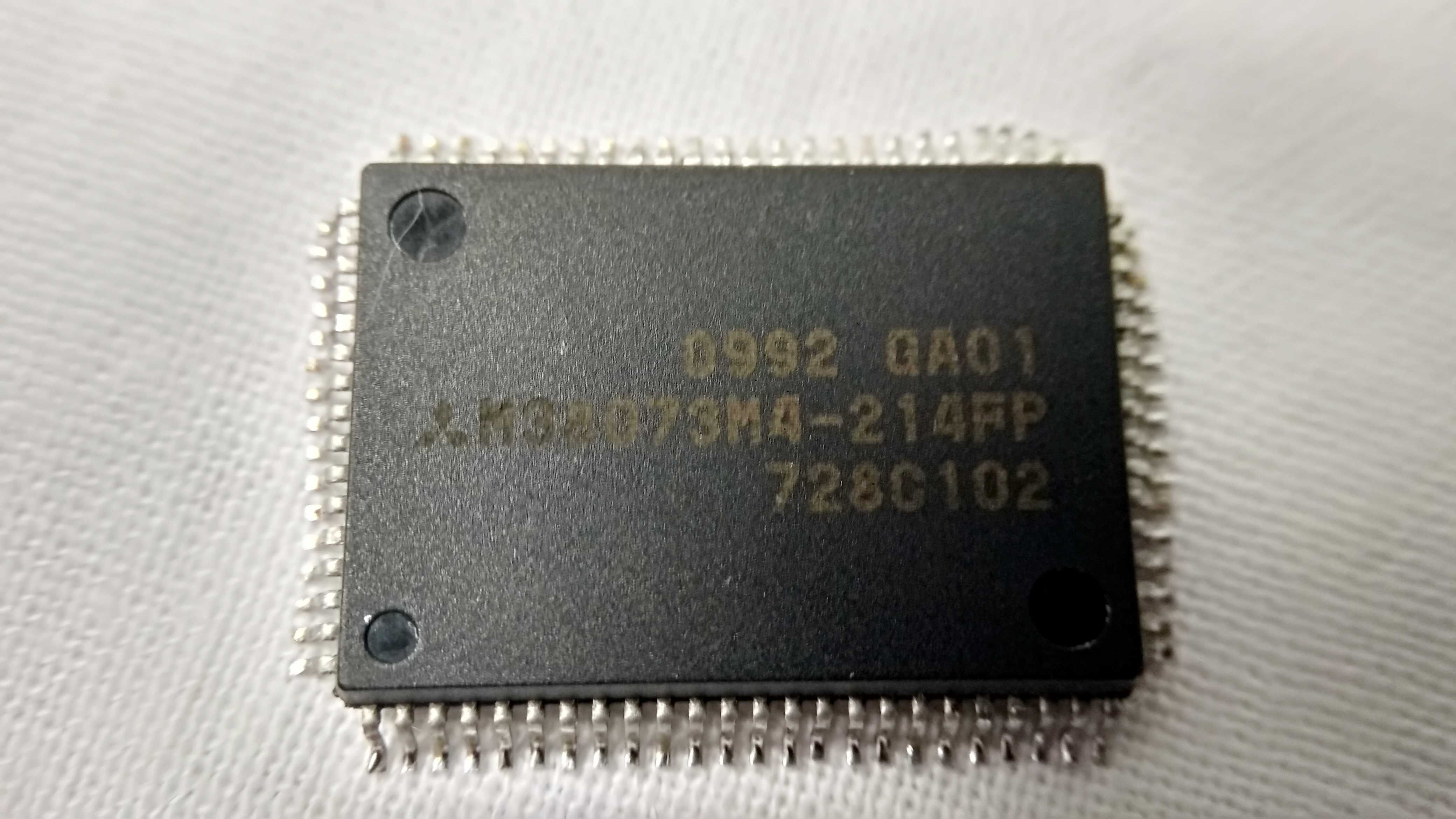 Мікросхема 0992 GA01 M38073M4-214FP 728C102