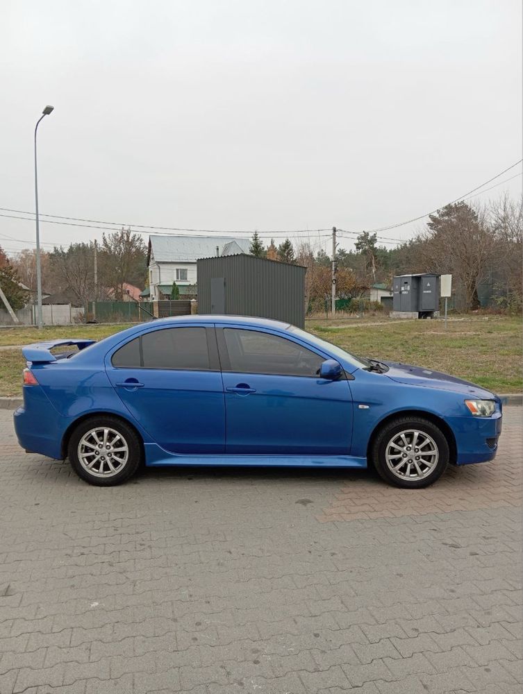 Lancer x 2009 газ/бен