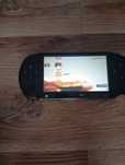 Sony PSP E,1004 1 gra i karta pamięci 2 GB