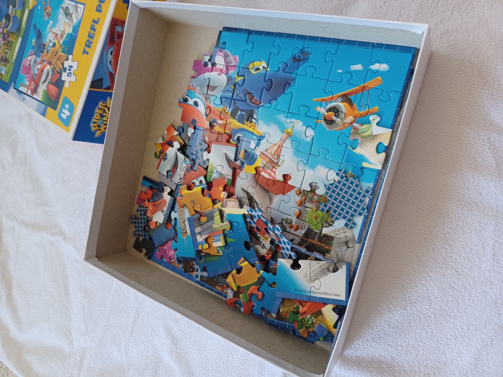 Puzzle 4w1 Super Wings Odlotowa paczka Trefl