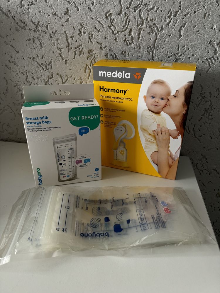 Молокосос Medela ручний + пакети для молока