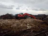 Wyburzenia budynków rozbiórki prace ziemne  ładowarka koparka
