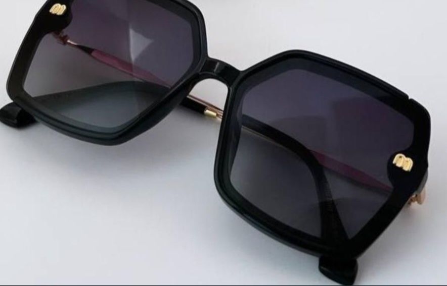 Очки солнцезащитные Miu Miu