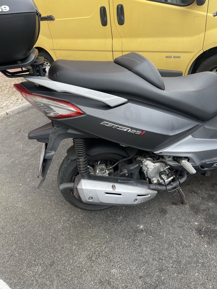 Sym 125 i gts  o motor parece um relogio ideal