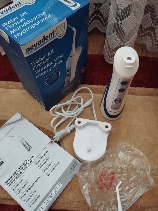 Портативний іригатор Nevadent NMD 3.7 B6 ( не тримає зарядку)