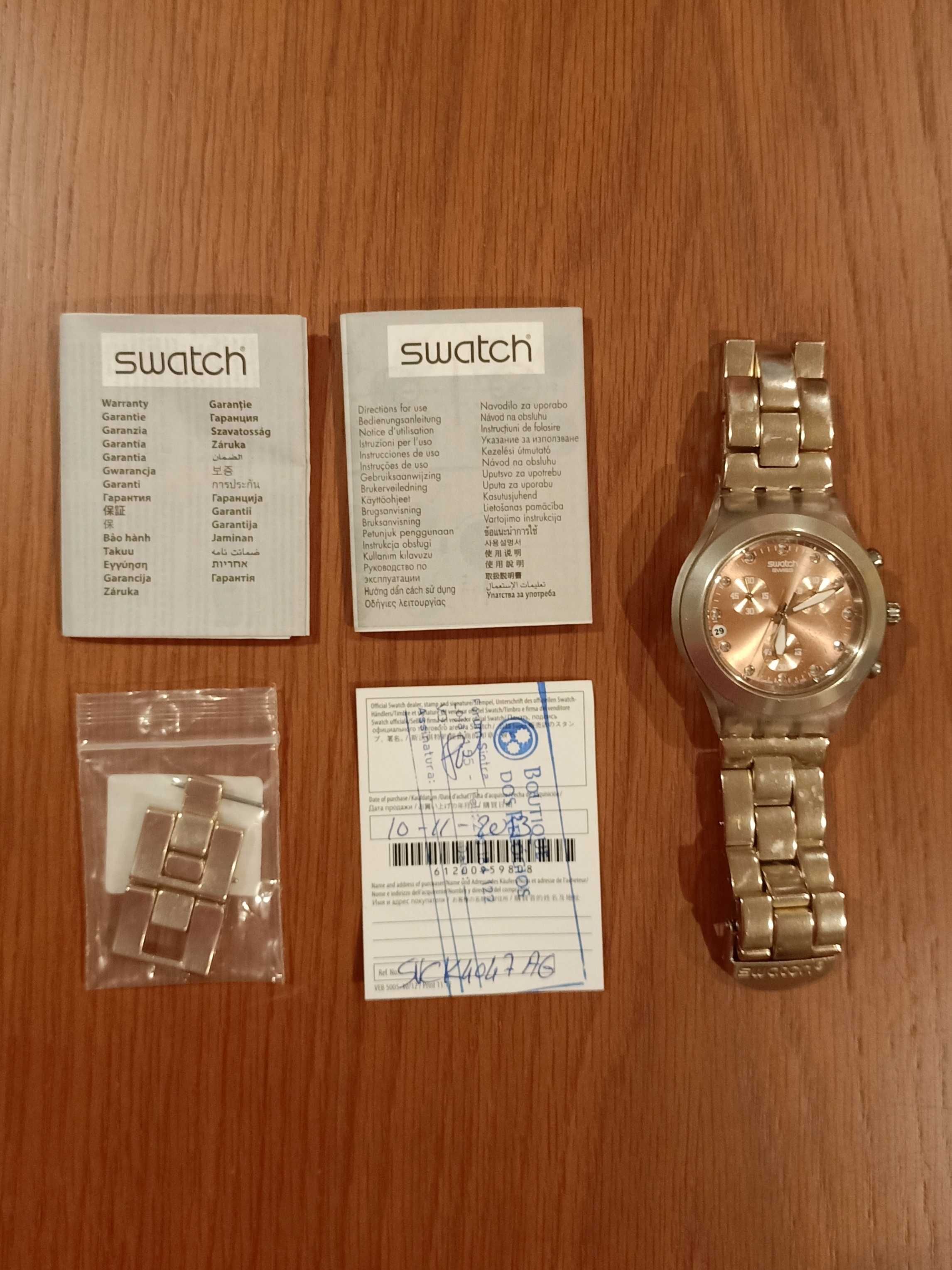 Relógio Swatch dourado