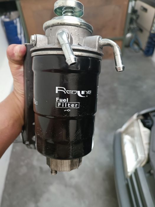 Corpo Peugeot e filtro toyota