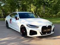 BMW Seria 4 M440i, 2023, 14000km przebiegu, biała perła