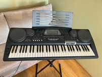 Keyboard CASIO CTK-731 z zasilaczem, skladanym stojakiem i pokrowcem