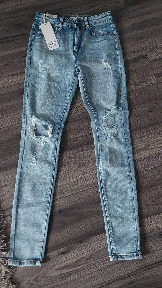 Jeansy dziury przetarcia legginsy