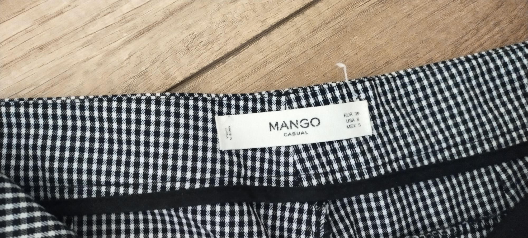 Вкорочені штани Mango вклітинку, зелені джинси.
