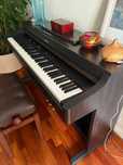 Piano digital Roland HP103e