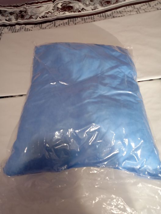 Подушка и простирадло нові