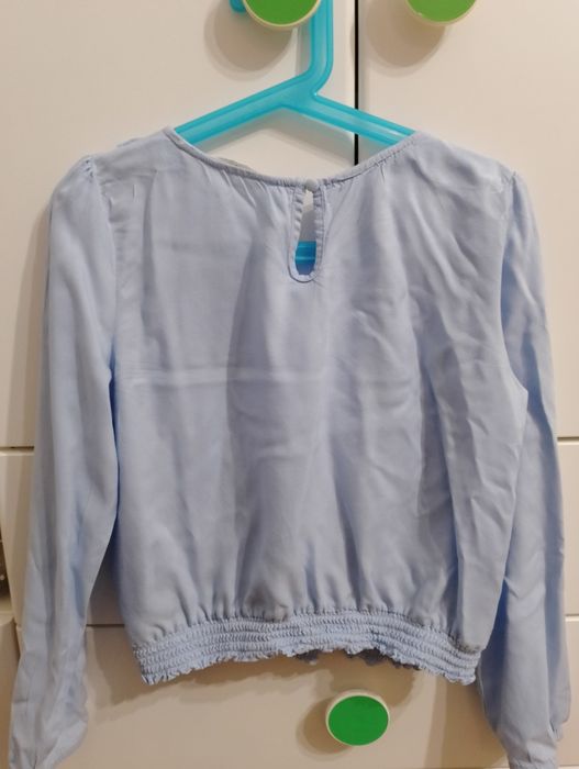 Elegancka błękitna bluzeczką HM rozmiar 140
