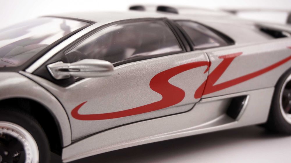 Модель Welly 1:18 Lamborghini Diablo SV (1995) Silver/Red