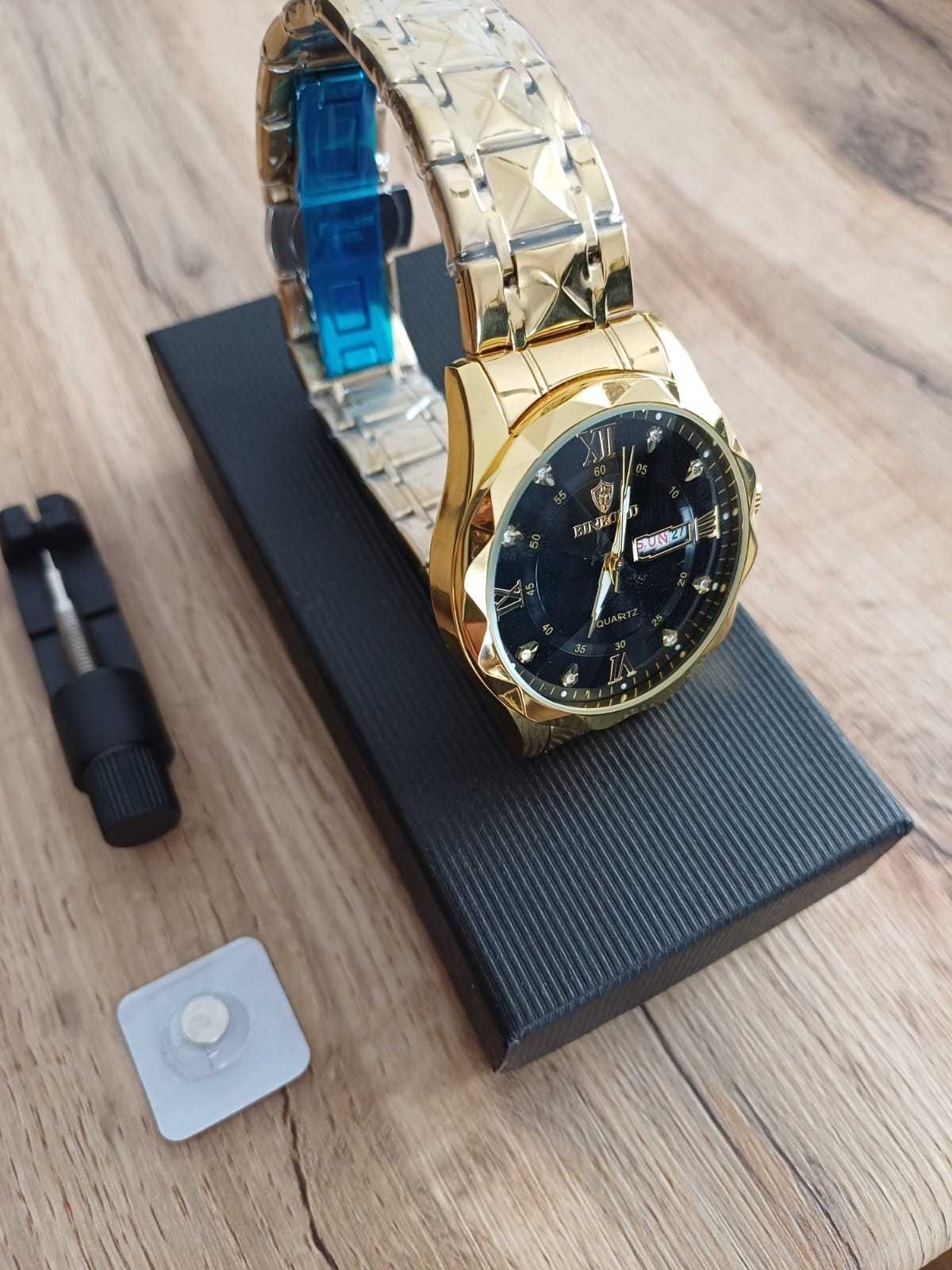 Nowy elegancki zegarek męski złoty