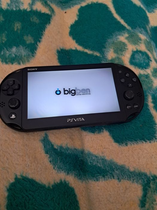 Ps vita slim com jogo