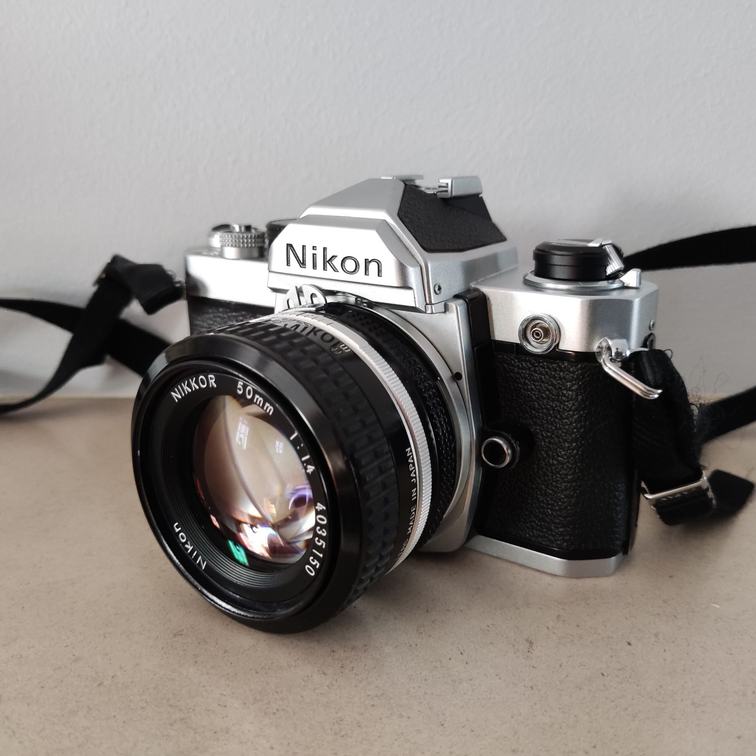 Nikon FM + Nikon Nikkor 50mm 1:1.4 Ø 52 mm (Caixa Original + Filtro)