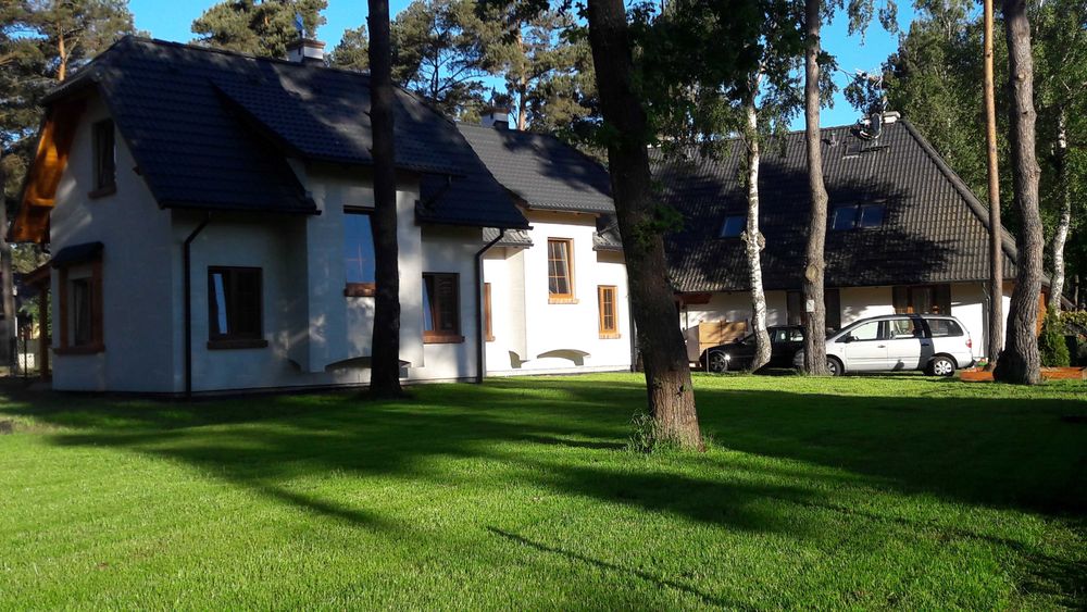 Domki nad morzem jacuzzi wakacje morze Jarosławiec plaża Dubaj las