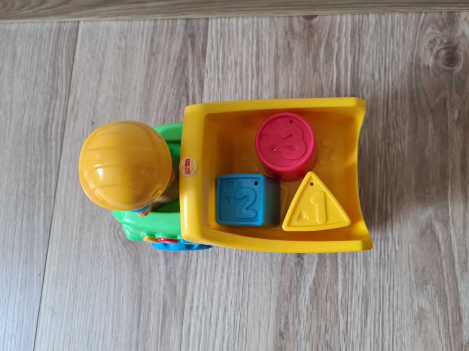 Wywrotka Szczeniaczka -uczniaczka Fisher Price samochodzik