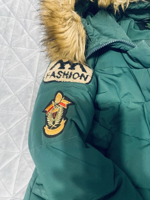 Пуховик  зимовий, теплий.