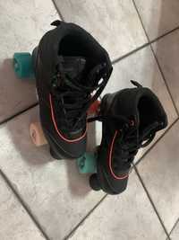 Patins pretos 4 rodas ( quads oxelo )