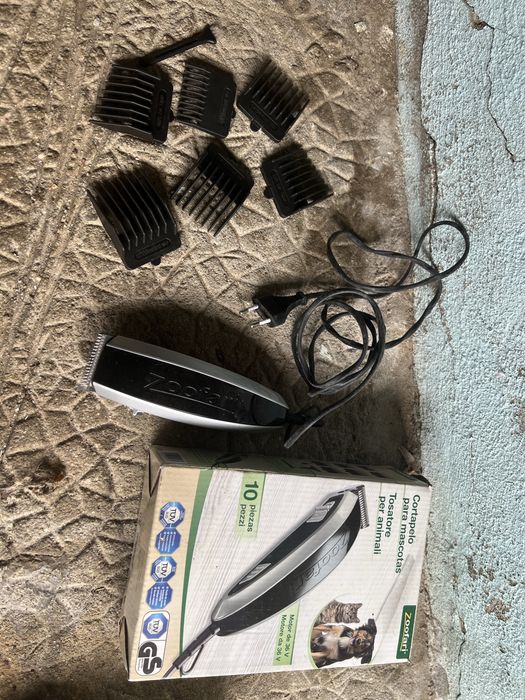 Maquina de cortar pelo aos caes