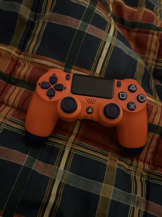 Comando ps4 laranja e azul