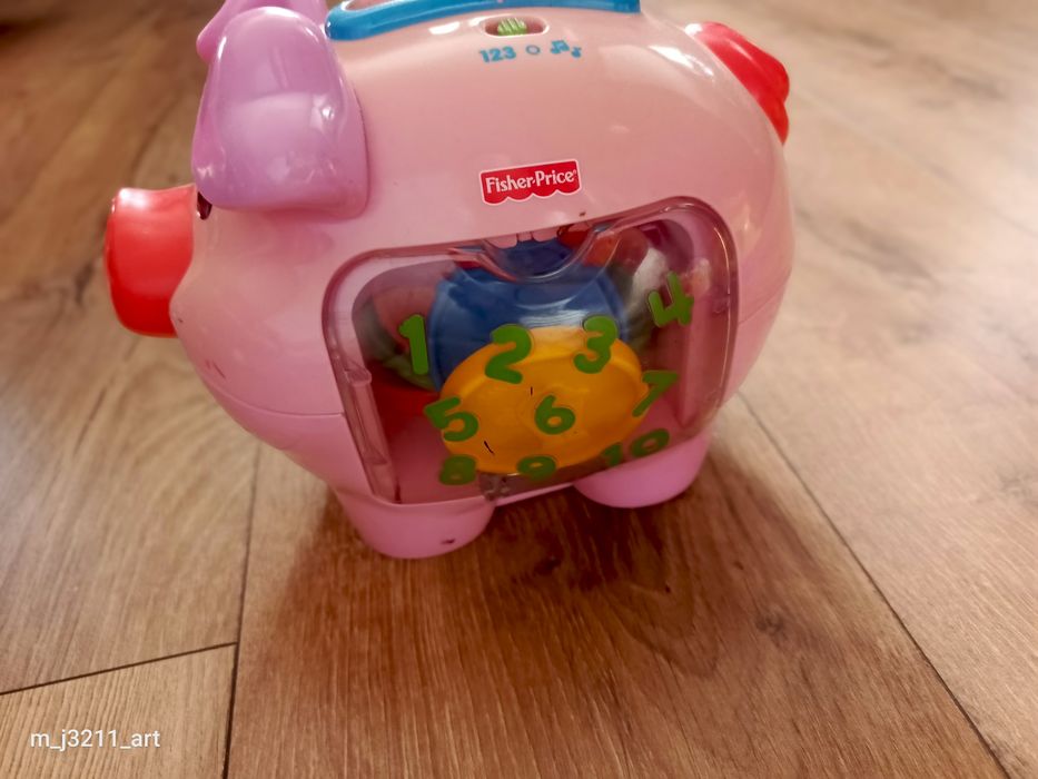 Świnka skarbonka Fischer Price
