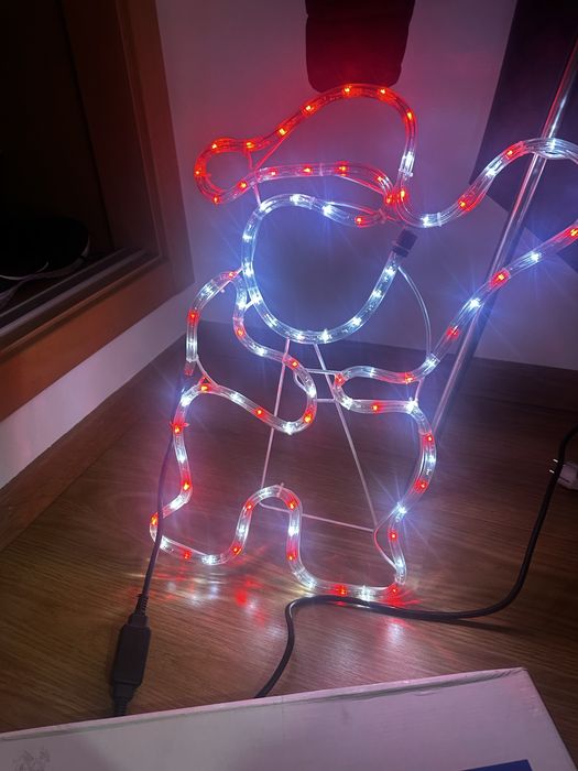 Pai natal com luz para varanda