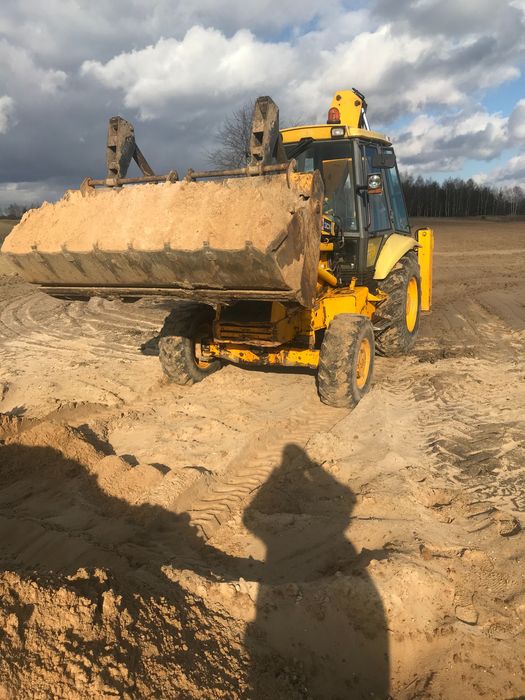 Usługi koparko-ładowarką,koparką kołową,ziemia,piach,wyburzenia