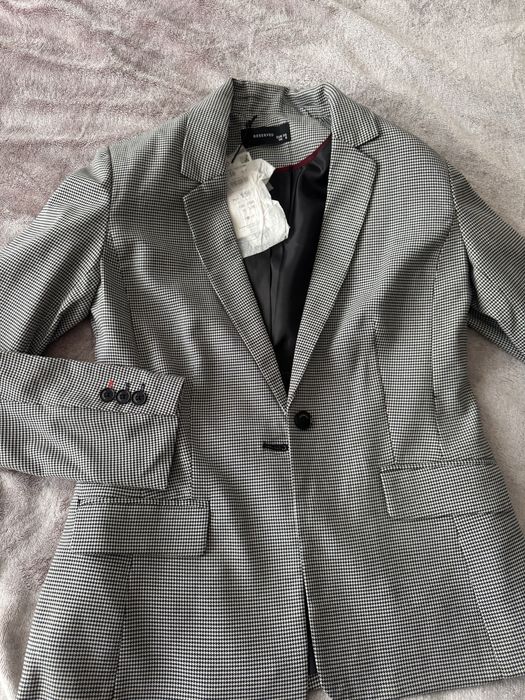 Жакет жіночий новий в клітинку