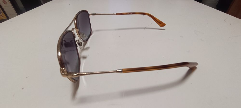 Óculos Polaroid e Web