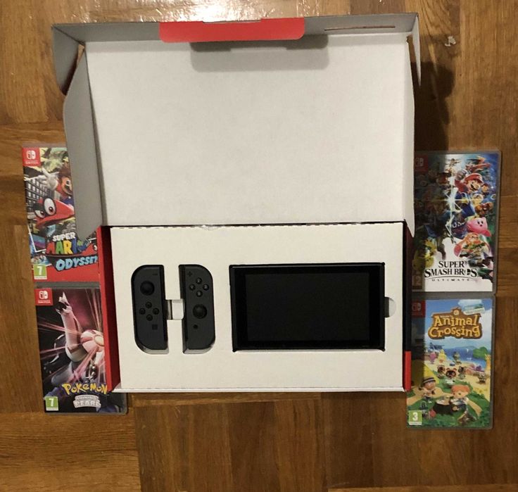 Nintendo Switch V2 + 4 gry