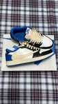 Jordan 1 Low Travis Fragment