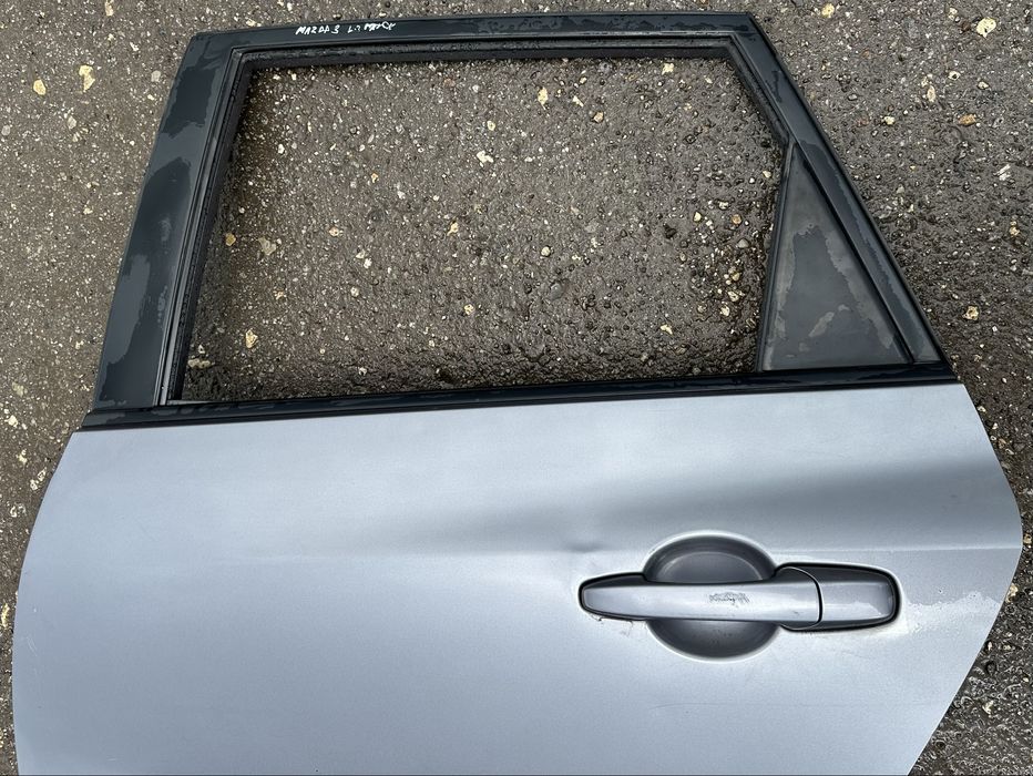 Дверка задня ліва Mazda 3 bk хетчбек(ціна за голу дверку)