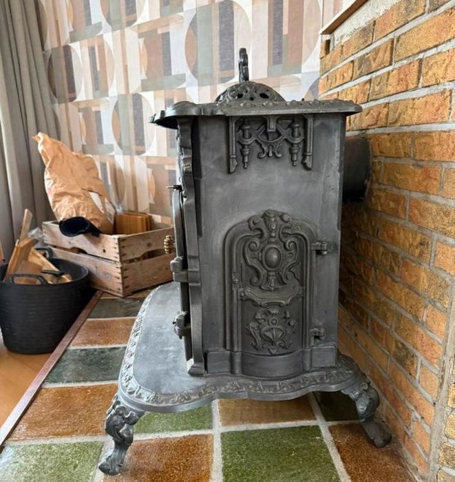 Kominek żeliwny wolnostojący