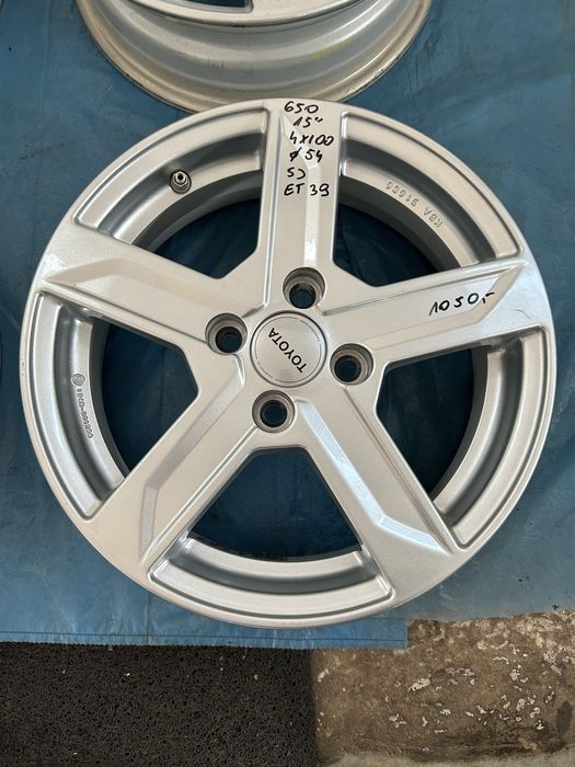 650 Felgi Aluminiowe TOYOTA R 15 4x100 otwór 54 Bardzo Ładne