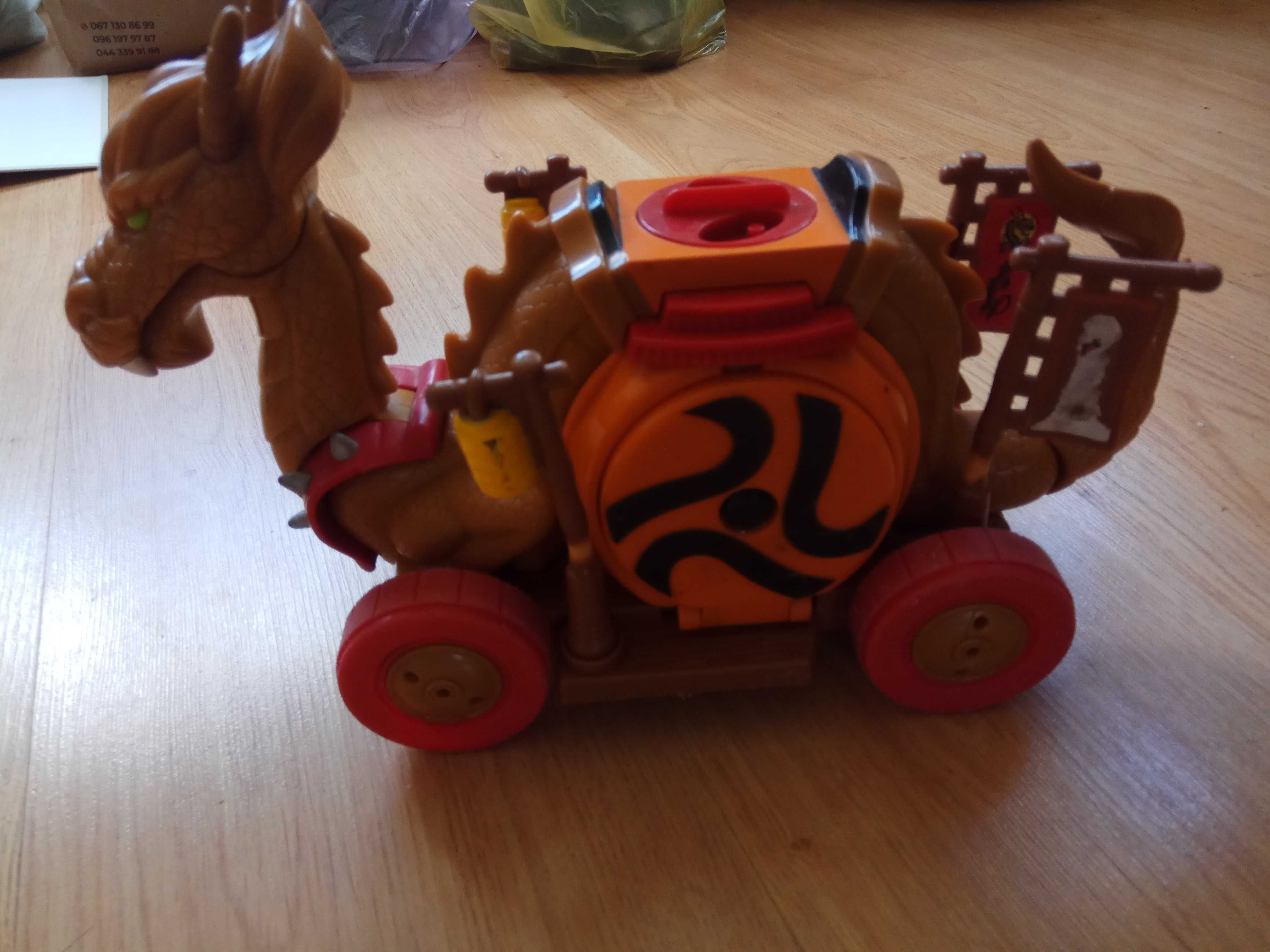 Китайський самурай-дракон на колесах Fisher Price